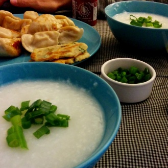 Comfort food = dumplings from a nearby Chinese supermarket, green onion pancakes and congee (I chopped the green onion too coarsely).